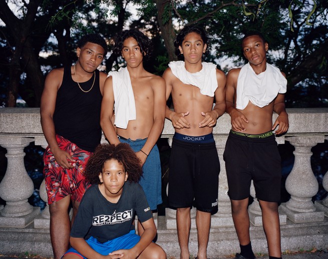 several boys in a line pose for a picture