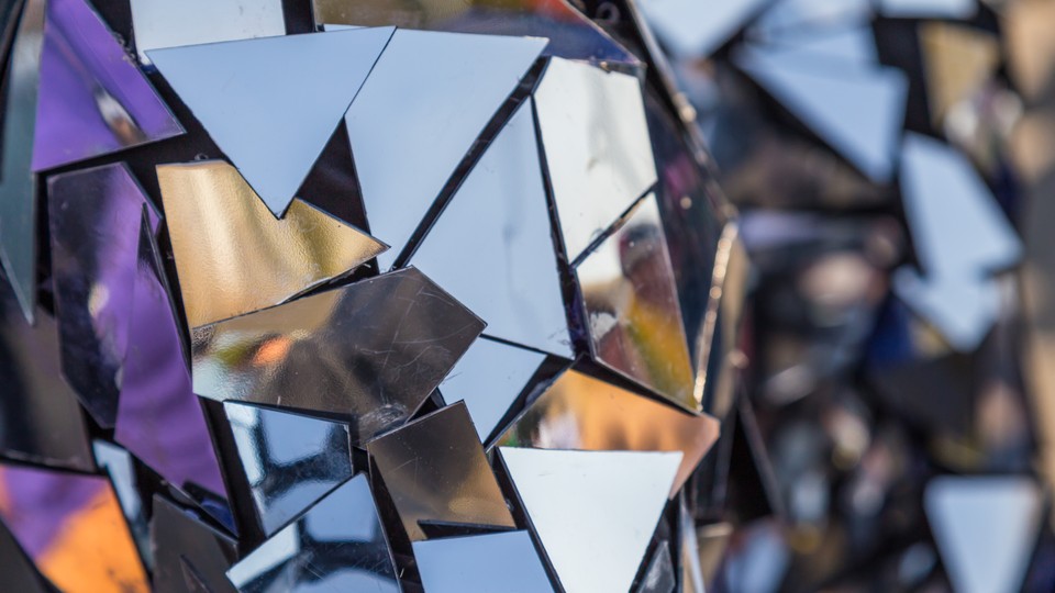 A sculpture made of small polygonal mirrors