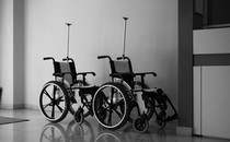 Empty wheelchairs in a health-care setting.