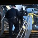 A police officer on a subway staircase