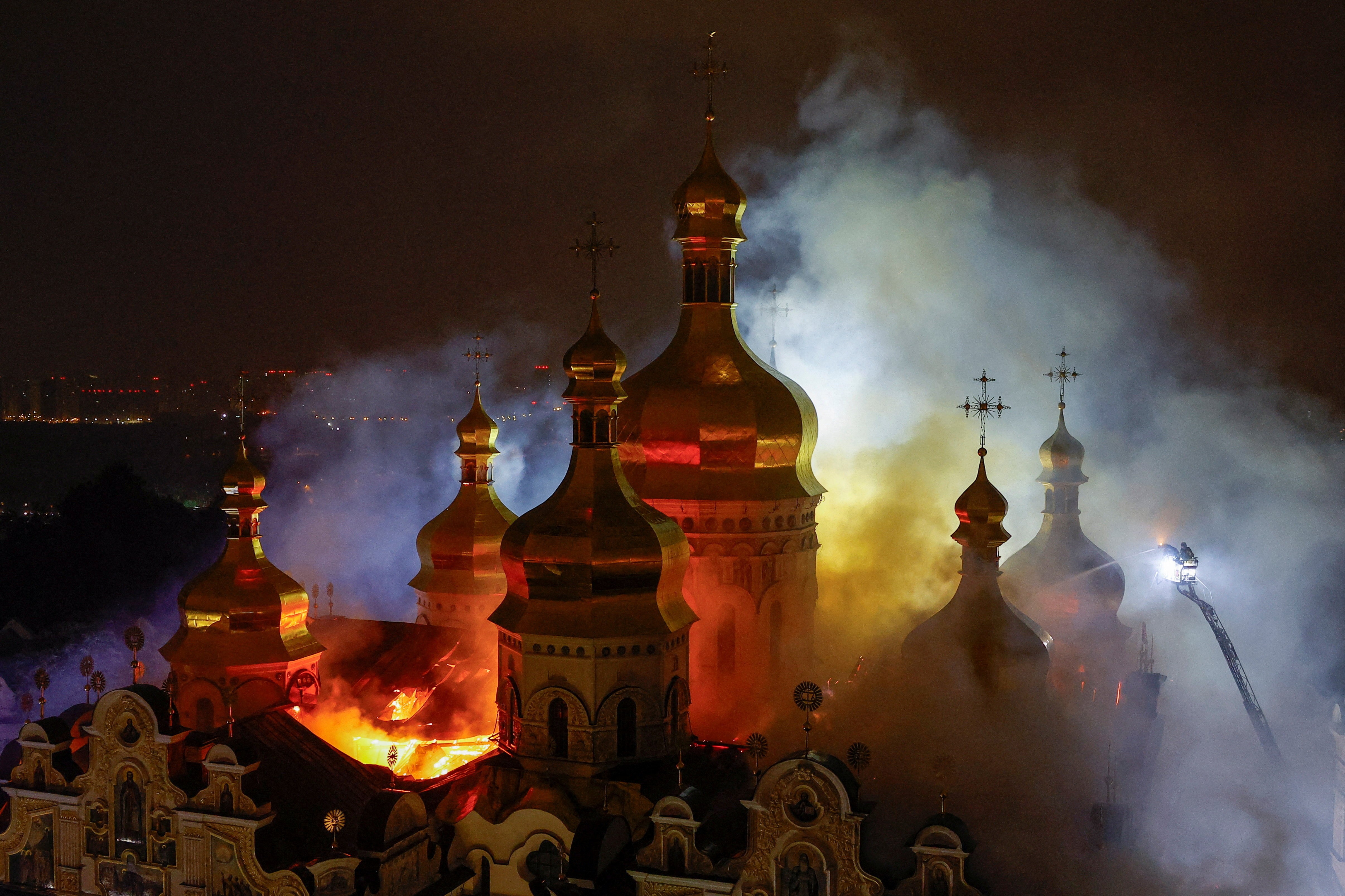 Firefighters work to put out a fire at a historic cathedral in Ukraine.