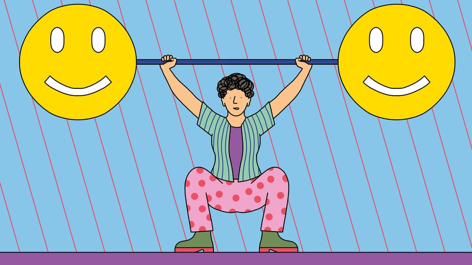 A person lifts a large barbell with smiley faces on either end.