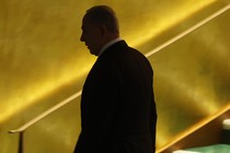 A photo of Benjamin Netanyahu walking away
