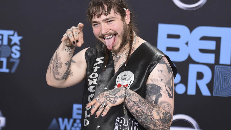 Post Malone arrives at the 2017 BET Awards.