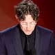 Photo of director Jonathan Glazer giving Oscar speech