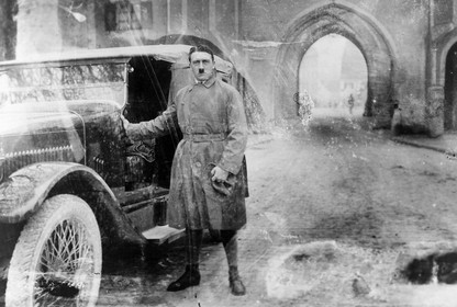 Adolf Hitler standing outside a car after his release from Landsberg Prison in 1924