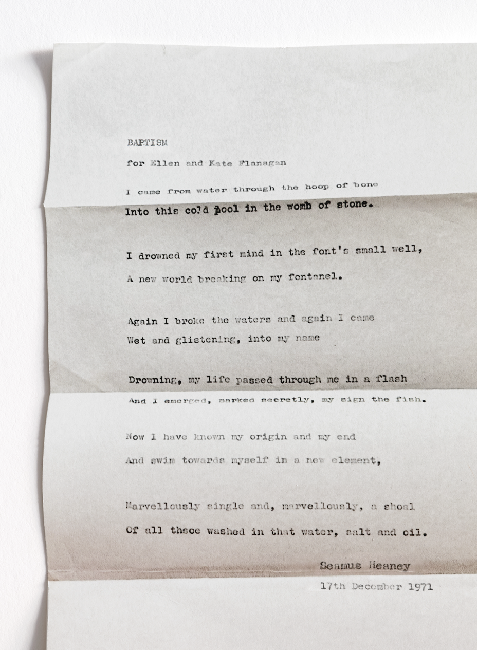 photo illustration with typed poem "Baptism" on folded piece of thin paper