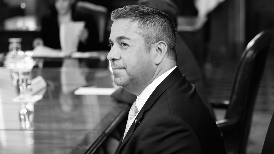 A black and white photograph of Senator Ben Ray Luján