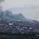 Smoke comes from the Lebanese village of Taybeh