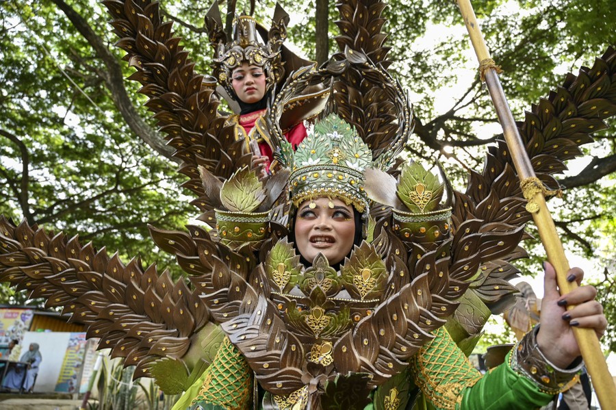 Carnival goers in elaborate costumes