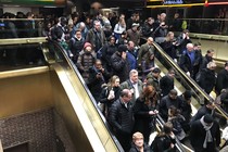 Commuters exit the New York Port Authority after reports of an explosion.