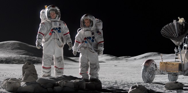 two astronauts standing side by side