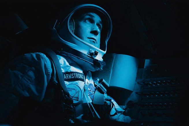 Ryan Gosling sits in a spaceship in "First Man"