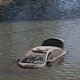 An abandoned vehicle floats in floodwater after a rainstorm in Dubai, United Arab Emirates.