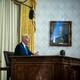 Joe Biden speaking at the Resolute desk in the Oval Office