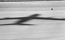 Photograph of a shadow of a plane