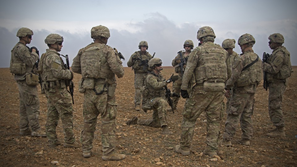 U.S. soldiers gather in Manbij, Syria, in November 2018.