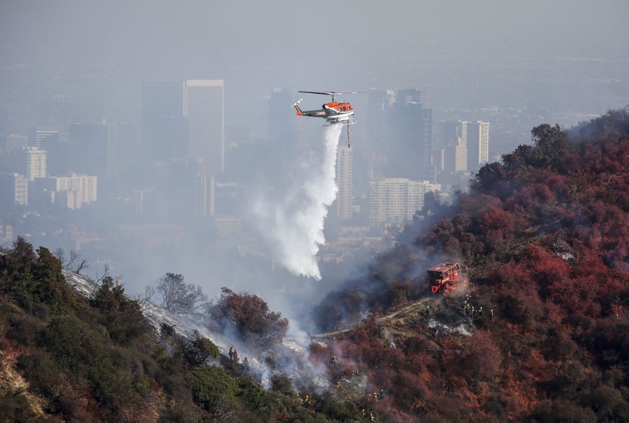 Photos Embers Fly in California’s WindDriven Wildfires The Atlantic