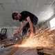 A man working with metal