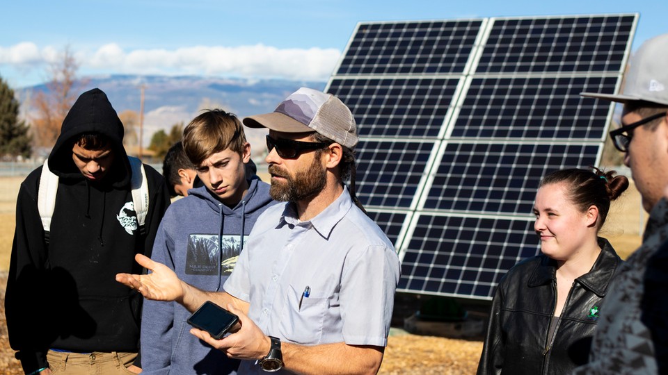 Ben Graves, a high-school science teacher in Delta County, Colorado, speaks to students in his Solar Energy Training class.