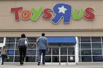 Two shoppers walk into a Toys "R" Us store