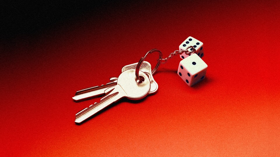 two keys attached to a keychain with two dice on it, against an ominous red background