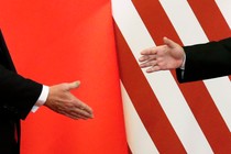Photo showing Xi and Trump shaking hands