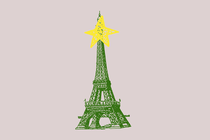 A green Eiffel Tower topped with a Christmas-tree star