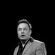 A photo of Elon Musk with a black background