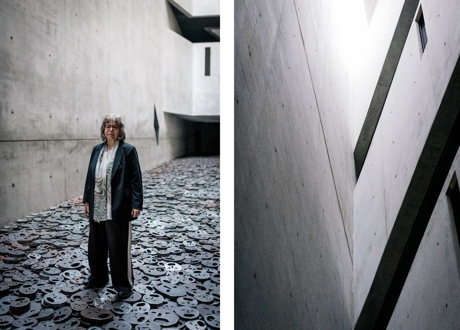 2 photos: woman standing on metal discs covering floor of large concrete room; a different view of the Memory Void