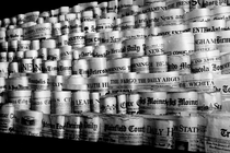 Rows of newspaper front pages