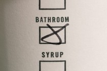 Starbucks cup with the bathroom option checked off