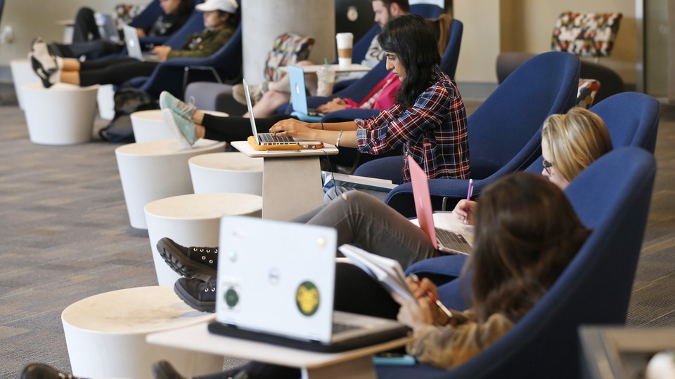 Students working on laptops