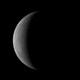 A picture of Mercury as a bright crescent against the darkness of space, taken by NASA's MESSENGER spacecraft in 2008