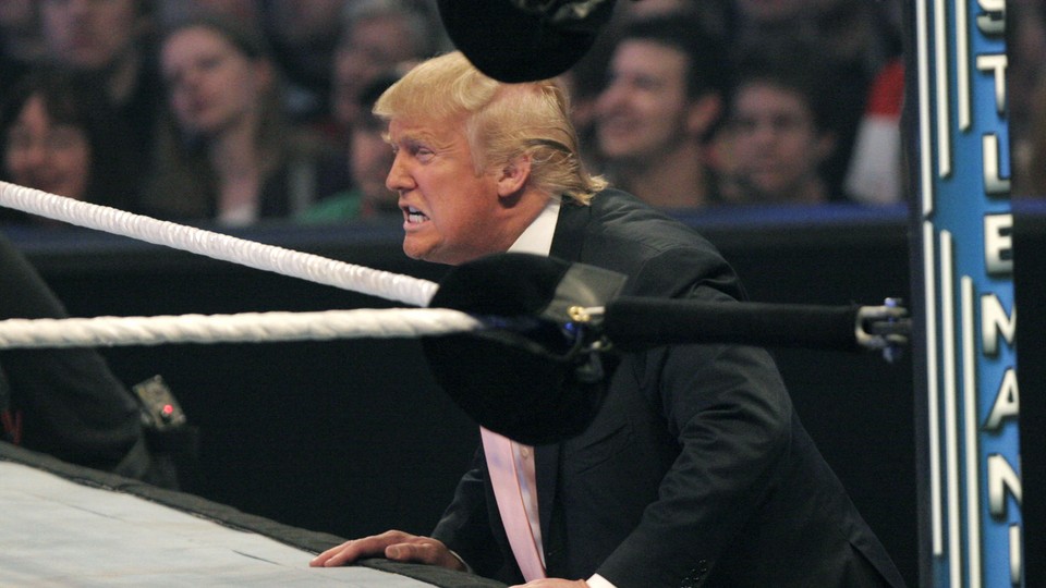 Donald Trump cheers on his fighter during the Battle of the Billionaires at WWE's 2007 WrestleMania at Ford Field in Detroit, Michigan.