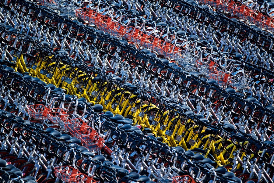 Bike Share Oversupply in China Huge Piles of Abandoned and Broken