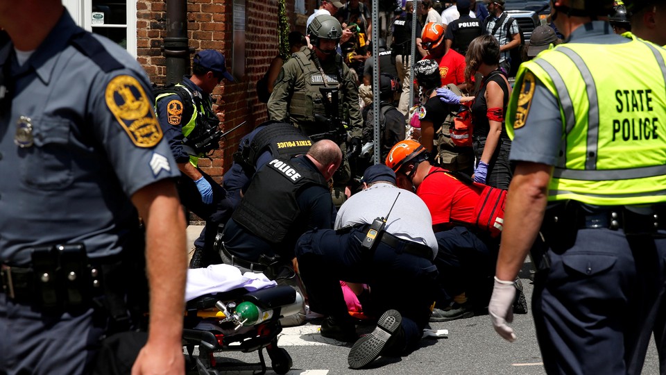 Rescue workers assist those injured at the "Unite the Right" rally in Charlottesville, Virginia, in 2017.