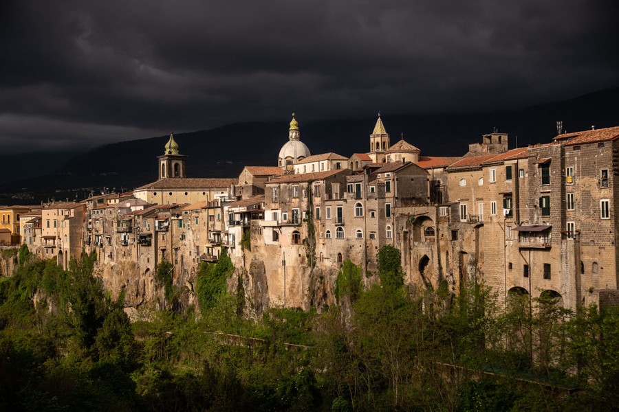 The taupe and tan walls of a historic Italian city.