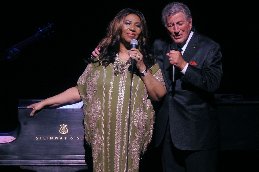 Aretha Franklin and Tony Bennett perform onstage.