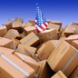 An American flag drowning in cardboard boxes