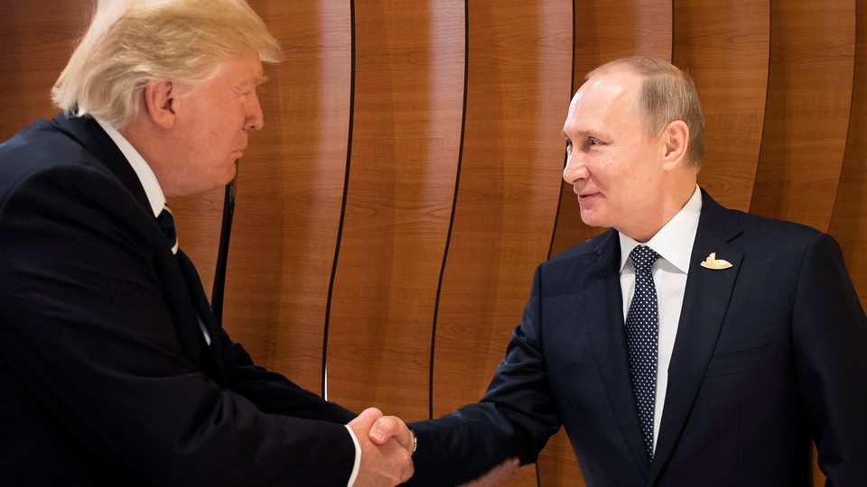 Trump and Putin shake hands during the G20 Summit in Hamburg, Germany on July 7, 2017. 