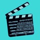 A film clapboard with binary code written on it