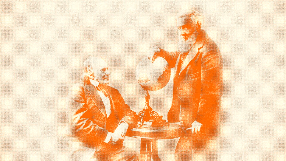 Image of two men and a globe