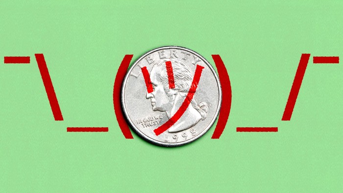 A quarter with a shrug emoji on top