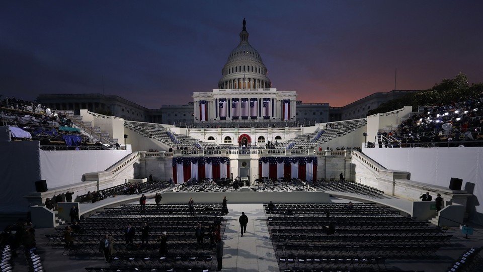 Workers prepare the grounds of the U.S. Capitol for the 2017 presidential inauguration.