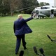 Photo of Trump waving to press as he leaves White House