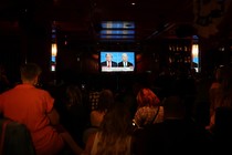 A photo of a group watching the CNN presidential debate