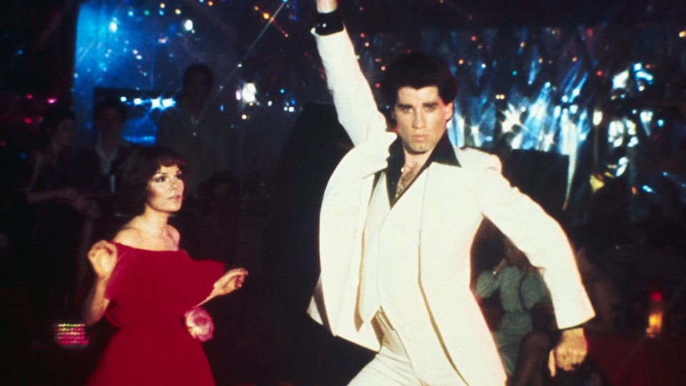 Actor John Travolta dancing with actress Karen Gorney in the movie Saturday Night Fever.