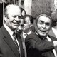 President Gerald Ford and Leonid Brezhnev smile in the foreground, while translator Victor Sukhodrev and Jan Lodal stand in the background.