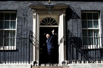 Boris Johnson walks through the door at Number 10 Downing Street.